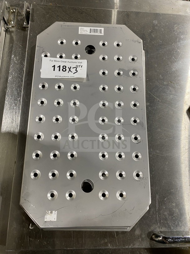 Winco SPFB-1 stainless steel full-size steam table pan false bottom, visible holes for drainage, label indicating auction details.
