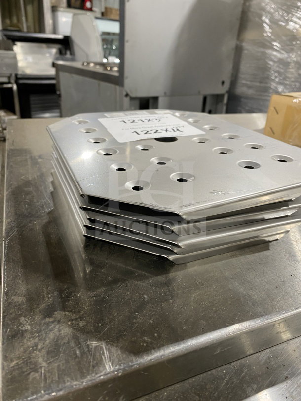 Winco SPFB2 stainless steel steam table pan false bottom, full-size, new condition, with perforated design for drainage.