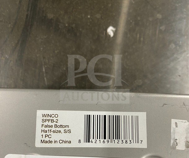 Winco SPFB-2 stainless steel false bottom for full-size steam table pan, labeled with model, size, and origin.