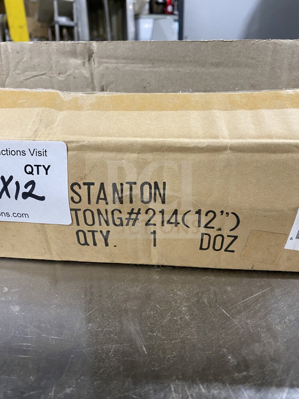 Brand new Stanton Trading 12" stainless steel heavy-duty utility tongs in box. Box labeled "Stanton TONG#214(12")." Includes 1 dozen tongs.