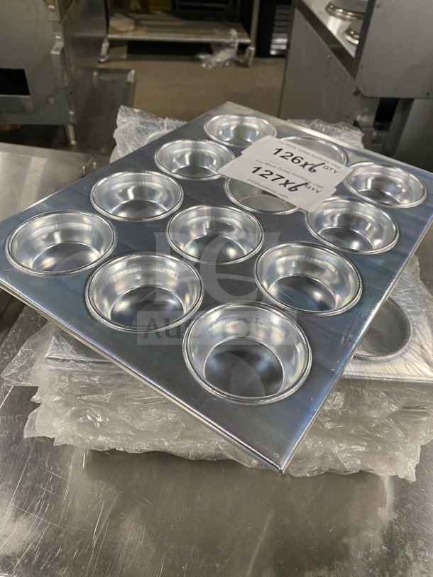 Thunder Group ALKMP012 new 12-cup muffin pan, 3.5 oz, aluminum, commercial kitchenware. Protective packaging visible.