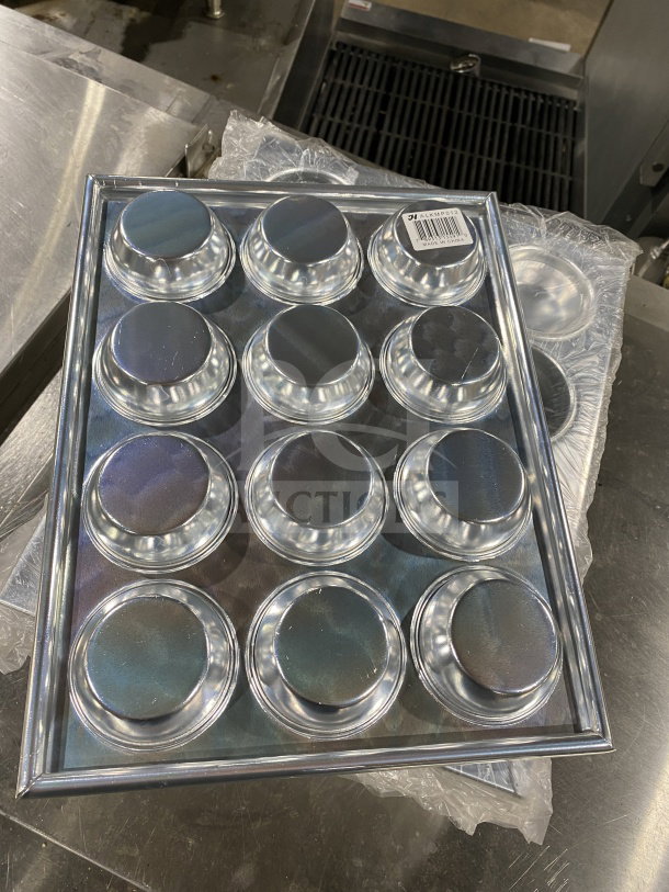 Thunder Group ALKMP012 aluminum muffin pan, 12-cup, 3.5 oz capacity, new condition, barcode tag visible.