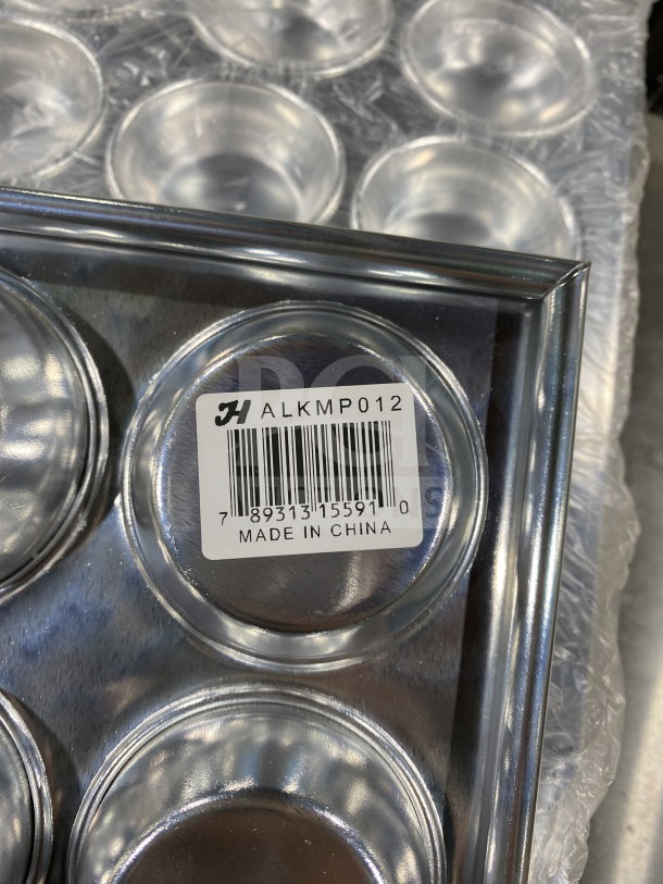 Thunder Group ALKMP012 aluminum muffin pan, 12 cups, 3.5 oz each, new condition, commercial grade, "Made in China" label.