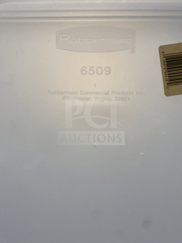 Rubbermaid Commercial food container cover, model 6509-00-WHT, white polyethylene, brand and model markings visible.