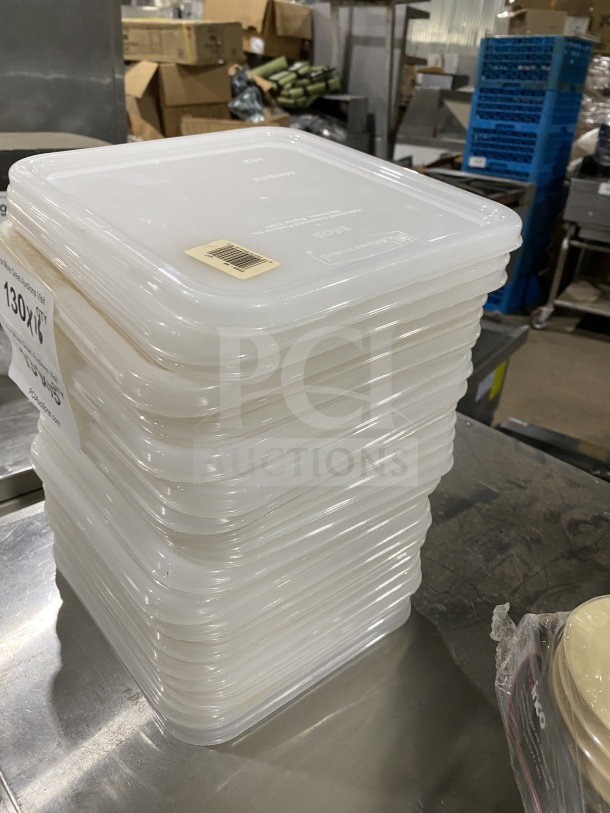 Stack of Rubbermaid Commercial polyethylene plastic square food storage container covers, Model 6509-00-WHT, new condition.