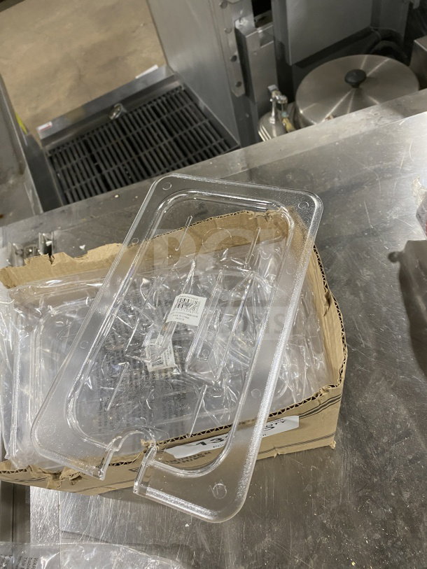 Brand new Thunder Group polycarbonate food pan lid, model PLPA7140CS, with notch and handle. Serial: 78931353761.