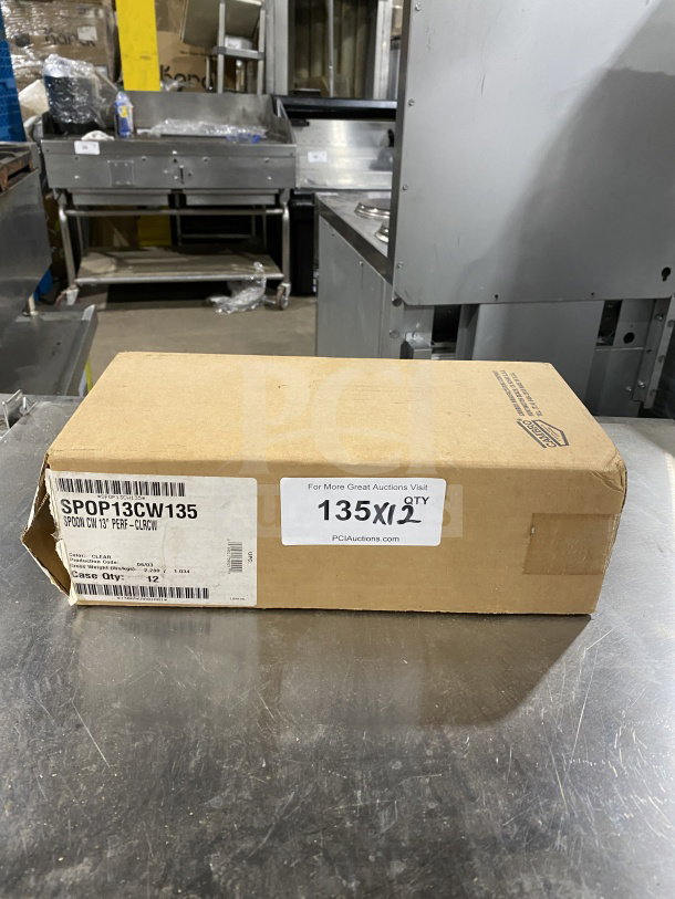 Box of 12 Cambro Camwear Series Clear 13” Perforated Deli Spoons, Model SPOP13CW135, new condition, label visible.