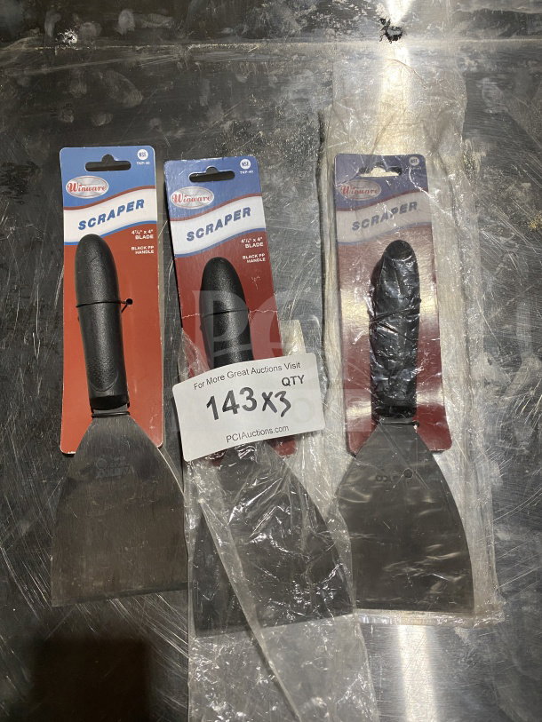 Winco Winware TKP-40 stainless steel scrapers with black slip-resistant handles, model TKP-40, pack of three, new condition.