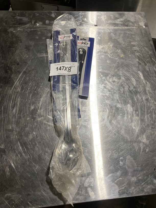 BRAND NEW Winco Prime Series stainless steel perforated buffet serving spoon, in package, ideal for commercial use.