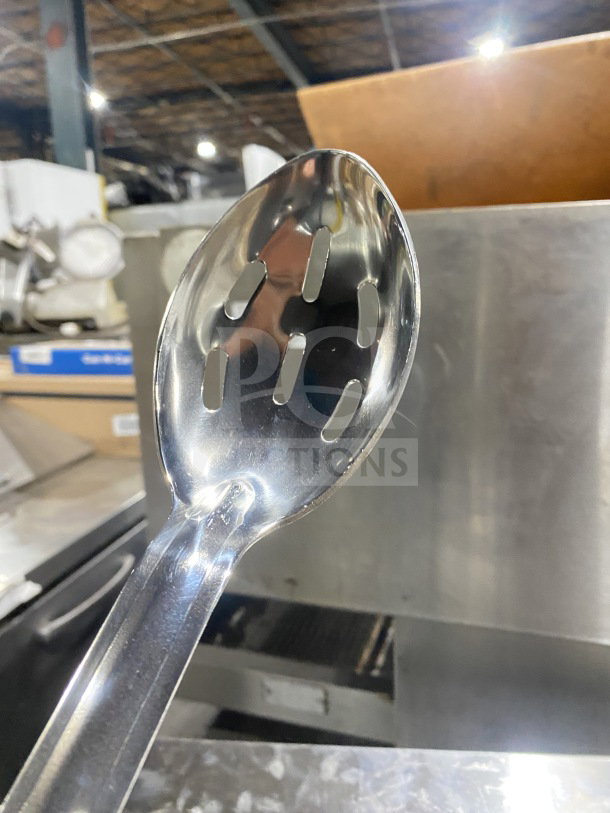 Brand new Winco Prime Series stainless steel perforated serving spoon. Durable, commercial-grade quality.
