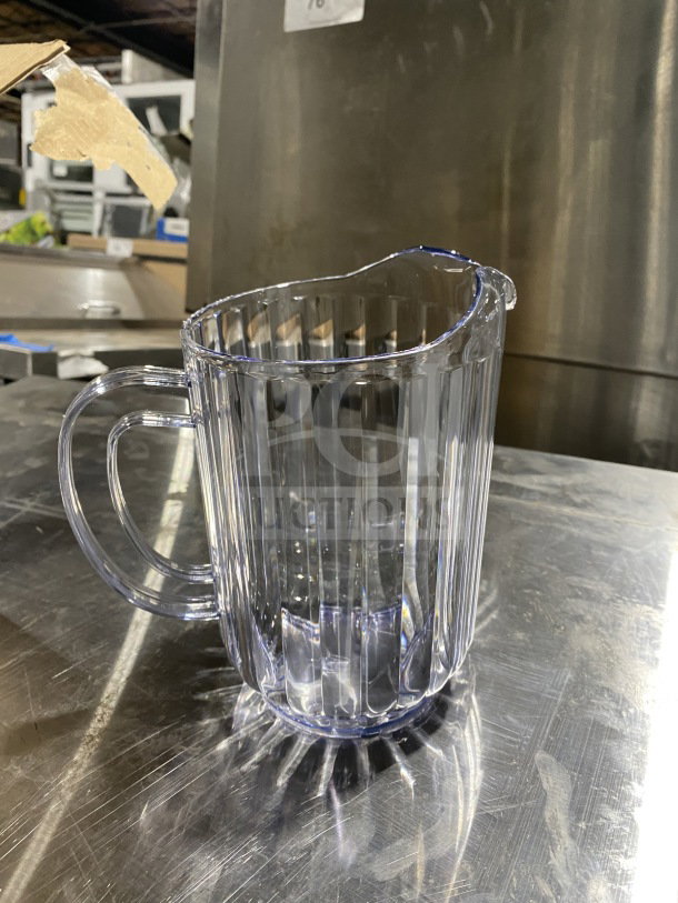 BRAND NEW Winco 60oz translucent plastic water pitcher, model WPS-60, clear ribbed design, sturdy handle.
