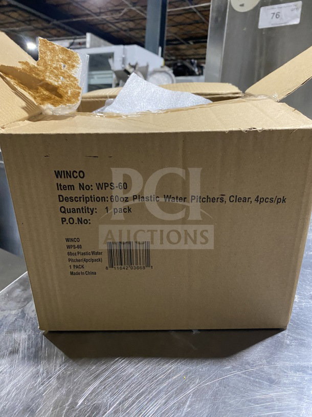 Box for 60oz clear plastic water pitchers by Winco, model WPS-60. Contains four pieces, made in China. Visible item details on box.