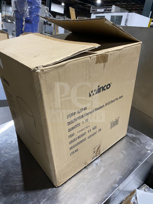 Boxed Winco ALST-60 60Qt Elemental Aluminum Stockpot, new. Model, weight, and dimensions printed on box.