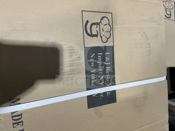 New in box L&J 18x36 stainless steel wall shelf. Packaging shows L&J Rest. Mg. Import NY Inc., NYC.