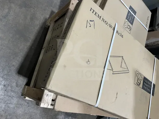 New L&J 18x36 stainless steel wall shelf in original packaging, labeled with model number WS1836, boxed on a pallet.