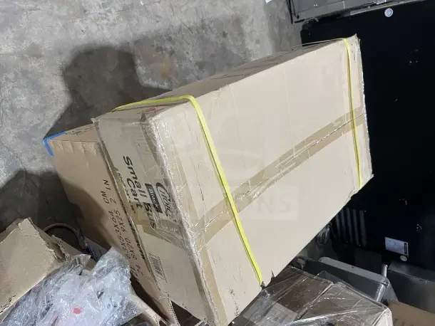 New Choice Small Bus Cart in box, 24x16 inches, on casters. Box shows intact packaging with product details visible.