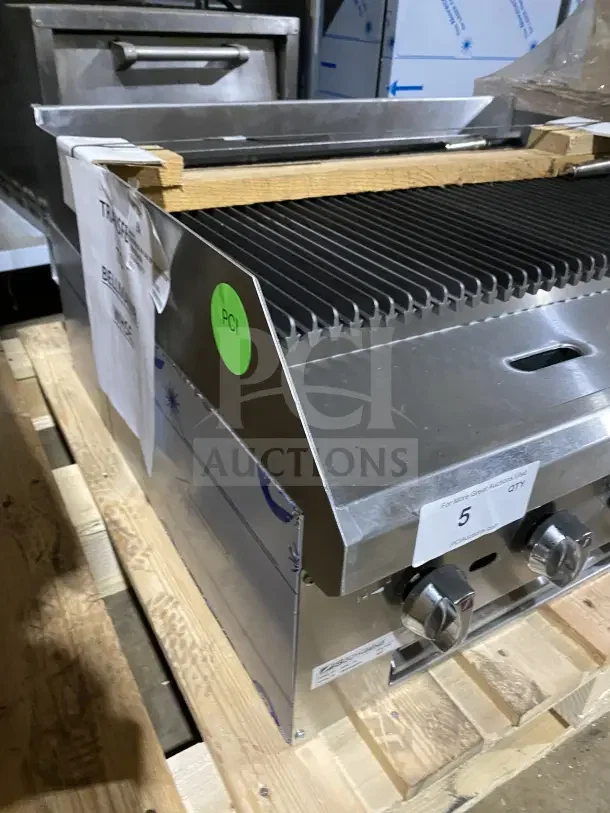 Brand new Southbend HDC36 stainless steel countertop gas char broiler grill with back and side splashes.