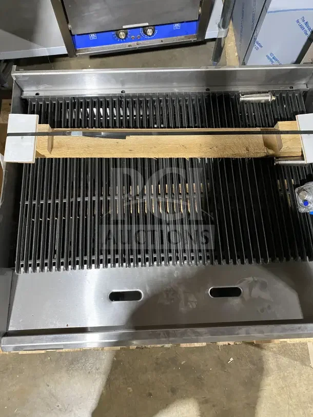 BRAND NEW Southbend HDC36 stainless steel gas char broiler grill with back and side splashes, shown open.