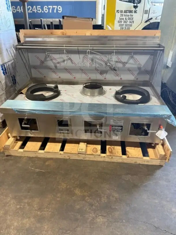 NEW Towns stainless steel 3-station natural gas wok range, model Y2SSN, serial 238489, unused on wooden pallet.