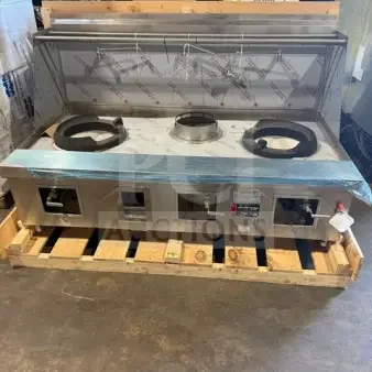 NEW Towns stainless steel 3-station natural gas wok range, model Y2SSN, serial 238489, unused on wooden pallet.