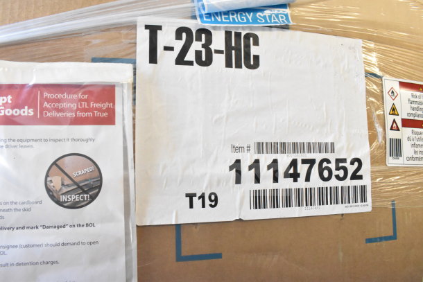 BRAND NEW True T-23-HC Reach In Cooler, single door, 115V, scratch and dent, label showing item #11147652.