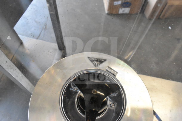 Brand new Mahlkonig E80W espresso bean grinder with visible scratch and dent. Model label visible on top.