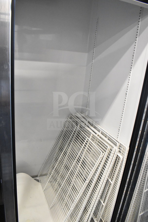 2018 True GDM-49-HC commercial 2 door cooler, visible interior shelves, excellent condition, 115V, 1 phase.