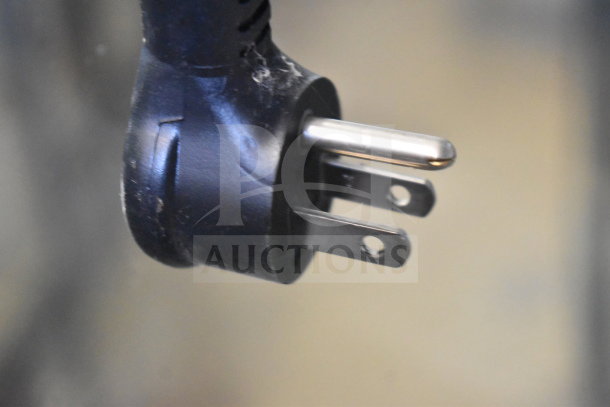 Close-up of a power plug for the 2018 True GDM-49-HC Commercial Cooler, 115 volts, 1 phase.