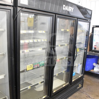 2016 True GDM-72-HC 3 Door Commercial Cooler Merchandiser, 115V, 1 Phase, glass doors, labeled "Dairy," used condition.