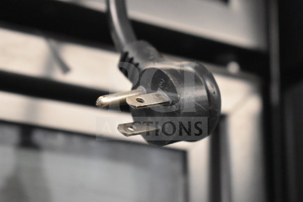 Close-up of the power plug for a 2019 True GDM-49-HC Commercial Cooler, 115 Volts, 1 Phase.
