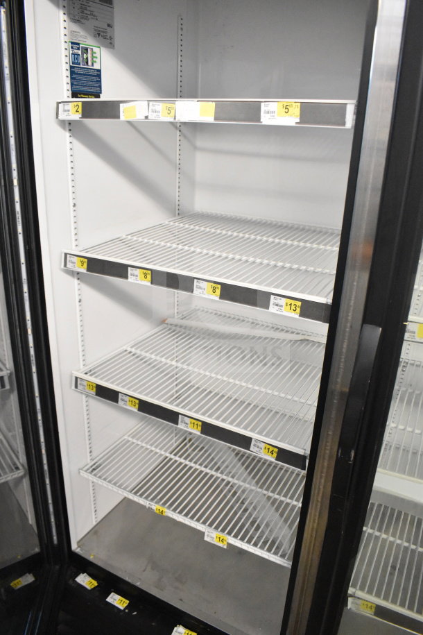 2019 True GDM-49-HC commercial cooler, 2 glass doors, 115 volts, clean interior, visible shelving labels.