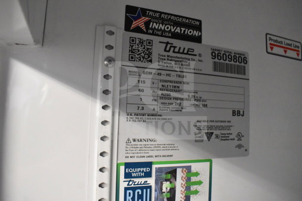 2019 True GDM-49-HC Cooler Merchandiser label. 115 volts, 1 phase, R290 refrigerant, model details, and warnings visible.