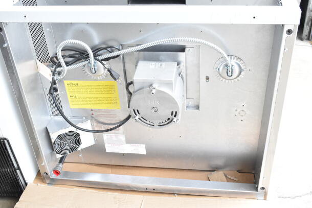 Back view of Blodgett Zephaire-100-G convection oven with visible wiring, labels, and electrical components. Brand new condition.