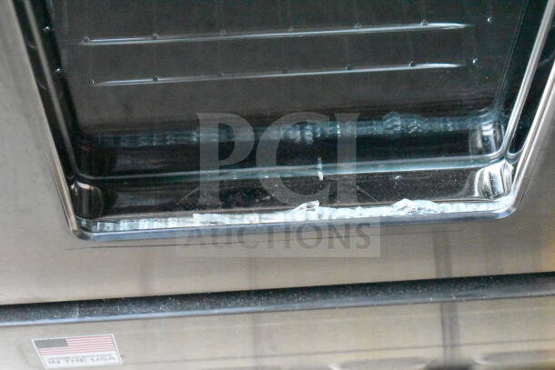 Brand new Blodgett Zephaire-100-G convection oven, 50,000 BTU, with view-through doors. Scratch and dent condition.