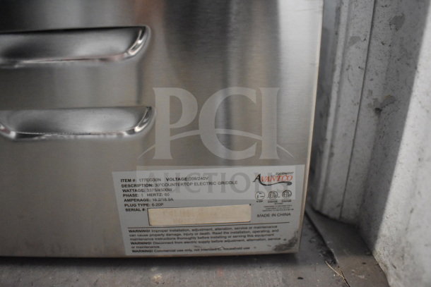 Brand new Avantco 177EG30N 30" electric countertop griddle; 208/240 volts, 1 phase. Scratch and dent condition.