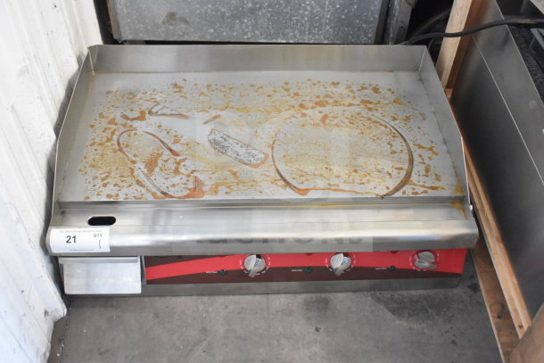 Avantco 177EG30N 30" electric countertop griddle, new with scratches, 208/240V, 1 phase, three control knobs.