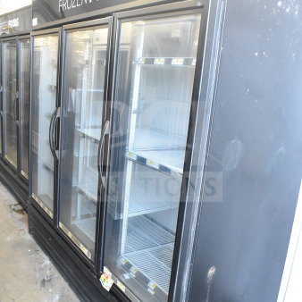 True GDM-72F-HC commercial 3-door reach-in freezer with glass doors, shelving, "Frozen Foods" label, 115/208-230V, 1 phase.