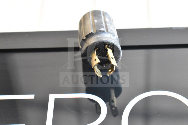 Electrical plug for 2016 True GDM-72F-HC Freezer Merchandiser, 115/208-230V, 1 Phase. Close-up view.