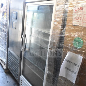 2021 True TSCI-600R-G-PH cooler merchandiser, glass door, 115 volts, good condition, labeled "Used Assets Store 4209."