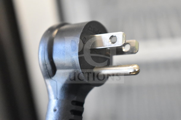 Close-up of 2021 True TSCI-600R-G-PH cooler plug, showing 115V, 1-phase connection. Ideal for commercial use.