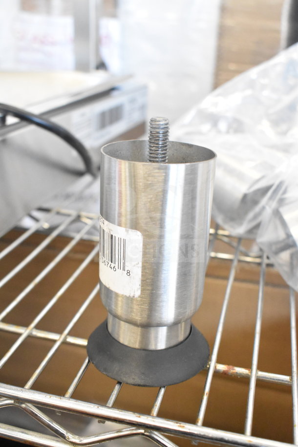 Adjustable 5" metal leg for food warmers, ServIt 423WDP21, with barcode label, new condition, on wire shelving.