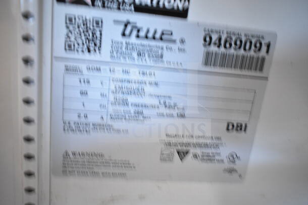 2018 True GDM-12-HC cooler label, model and specs, 115V, 1 phase, serial number 9469091, commercial use details.