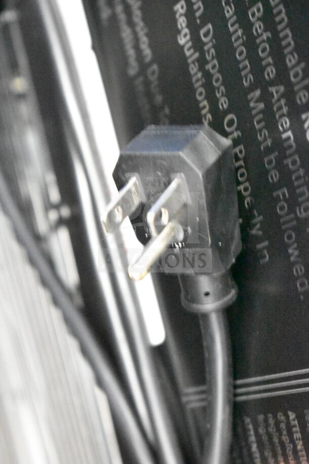 2022 IDW G-60e-NA34B Commercial Impulse Cooler, shows 110-120 volts plug, IDW branding, and safety instructions.