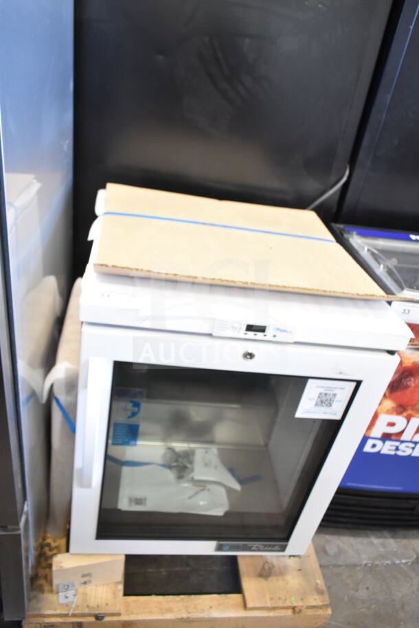 True TSCI-150PR-SWG-R-WW-1A commercial mini cooler merchandiser, 115V, 1 Phase, new condition, on pallet.