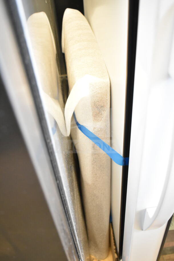 2025 True TSCI-150PR-SWG-R-WW-1A mini cooler with protective foam inside, sealed with blue tape. 115 Volts, 1 Phase.