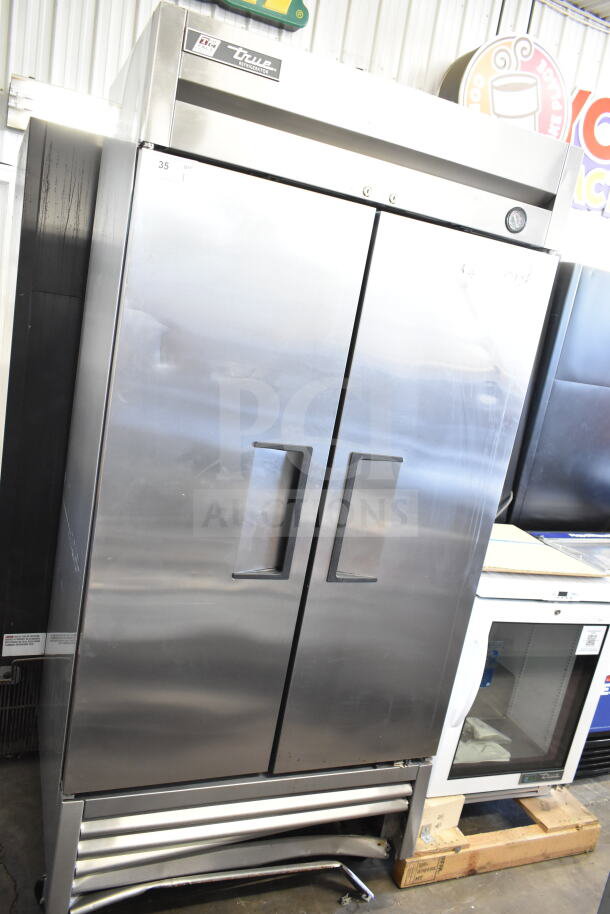 2016 True T-35 commercial 2 door reach-in cooler, 115 volts, 1 phase, stainless steel, visible True branding.