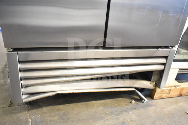2016 True T-35 Commercial 2 Door Cooler, stainless steel, 115 volts, dented base grille, used condition.
