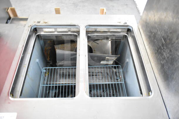 Delfield Commercial Sandwich Salad Prep Table, missing bolts for Bain Marie lid, 115V, 1 Phase, used condition.