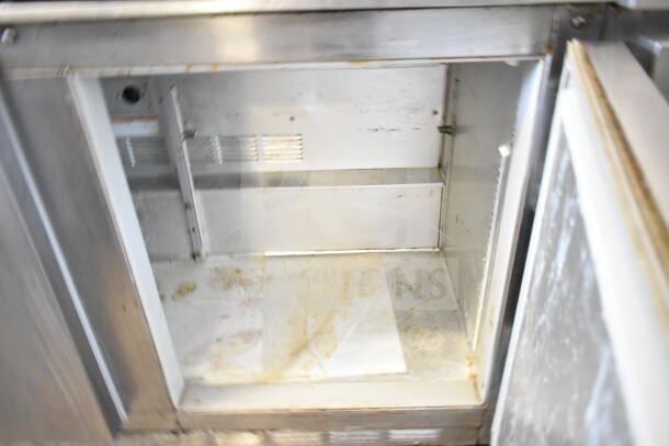 Beverage Air UCT48A commercial undercounter cooler, 2 doors. Used condition, 115 volts, 1 phase. Interior shows wear.