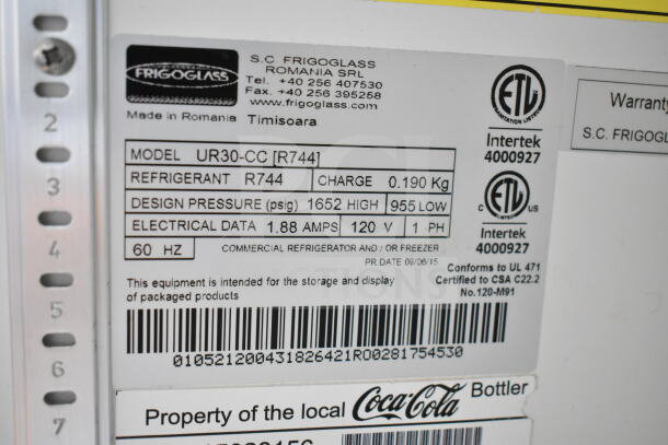 Frigoglass UR30-CC commercial mini cooler label detailing model, refrigerant R744, electrical data 1.88 amps, 120 volts.